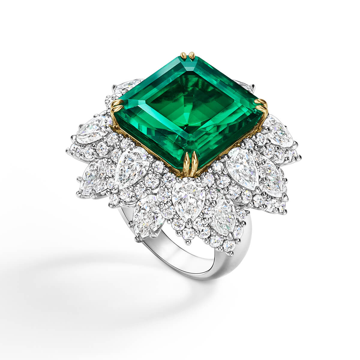 The Rockefeller-Winston ring featuring a square emerald-cut Colombian emerald center stone weighing 18.03 carats with 108 round brilliant and pear-shaped diamonds set in 18 karat yellow gold and platinum